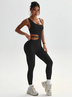 Beau design au dos, leggings de yoga sexy une pièce, adaptés aux combinaisons de sport respirantes et à séchage rapide pour femmes.