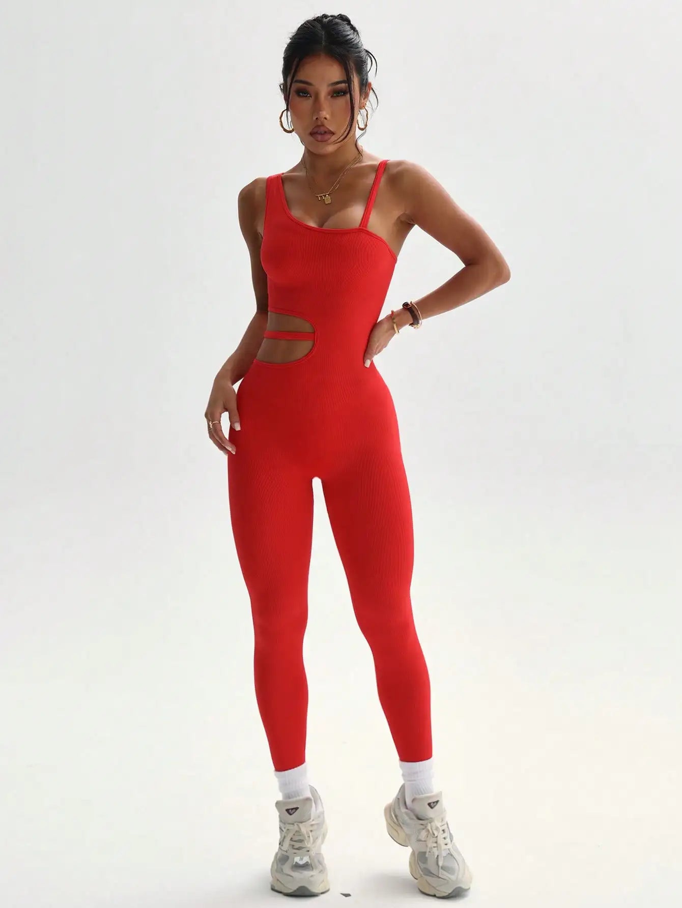 Beau design au dos, leggings de yoga sexy une pièce, adaptés aux combinaisons de sport respirantes et à séchage rapide pour femmes.