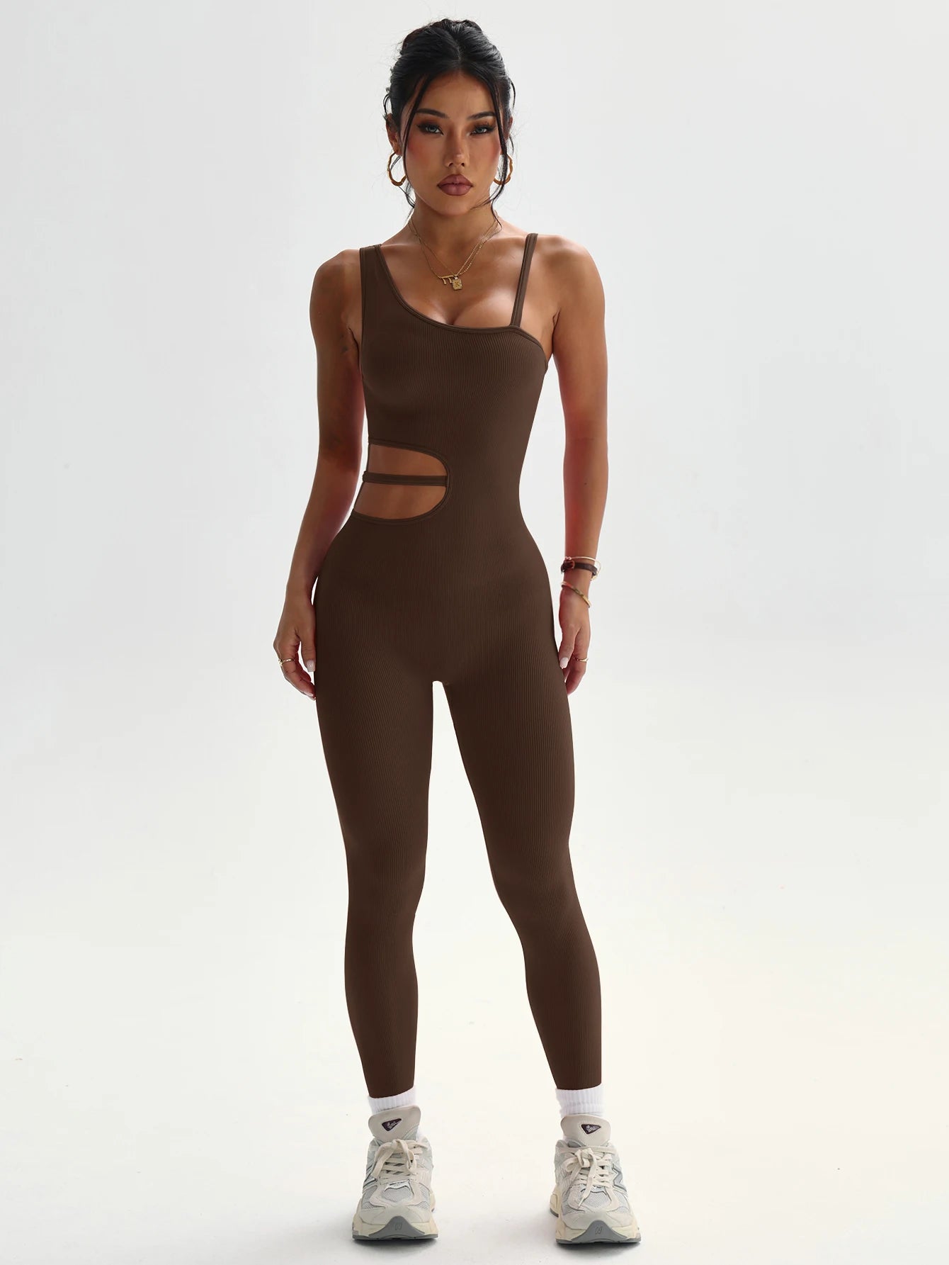 Beau design au dos, leggings de yoga sexy une pièce, adaptés aux combinaisons de sport respirantes et à séchage rapide pour femmes.