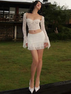 Ensemble 2 pièces haut court évasé à manches longues et Mini jupe plissée, Sexy, dentelle froncée, vacances d'été, tenues transparentes pour femmes - FATAONEnsemble 2 pièces haut court évasé à manches longues et Mini jupe plissée, Sexy, dentelle froncée, vacances d'été, tenues transparentes pour femmesMode FemmeFATAON